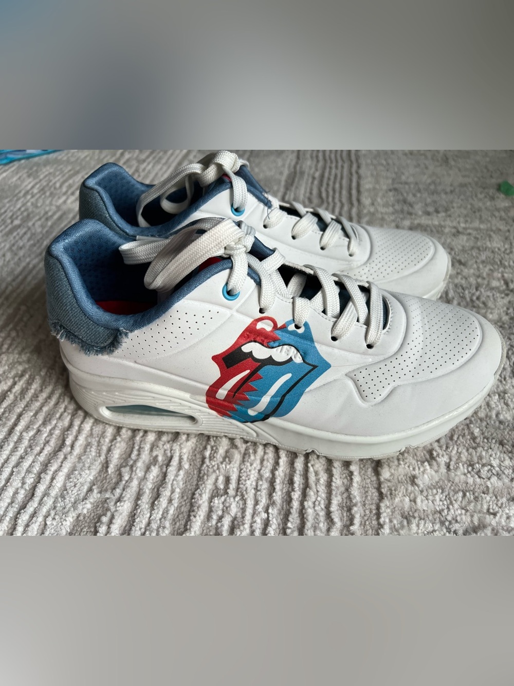 Women’s Rolling Stones Skechers Sneakers with Red & Blue Tongue Graphic